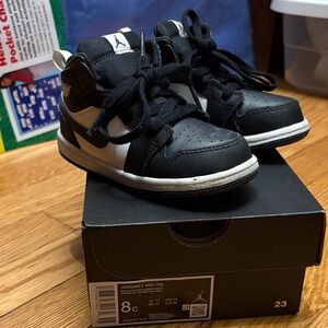 Jordan Kids Black and White Mid Sneakers